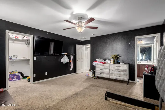 a bathroom with double sink and a mirror