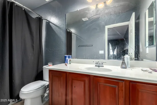 a view of a room with furniture wooden floor and window