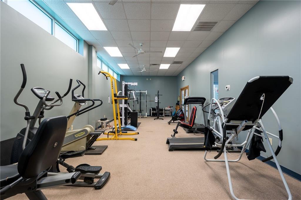 319 Peaceful Loop Chatsworth, GA 30705 - Photo 7 of 10 a view of a room with gym equipment
