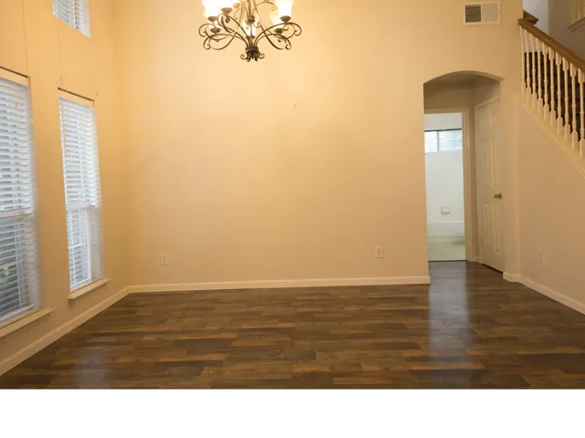 a black and white photo of a big room