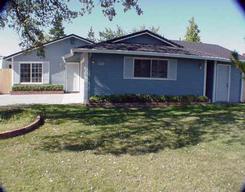 1000 Beltline Road, Unit 1 Redding, CA 96003 - Photo 1 of 1 a front view of a house with garden