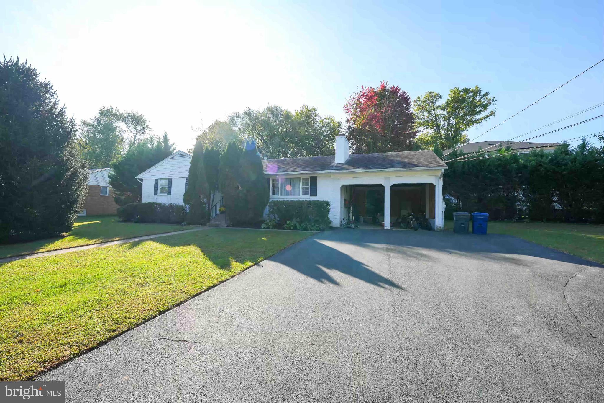 6809 Weaver Avenue, Unit B McLean, VA 22101 - Photo 8 of 11 front view of a house with a yard