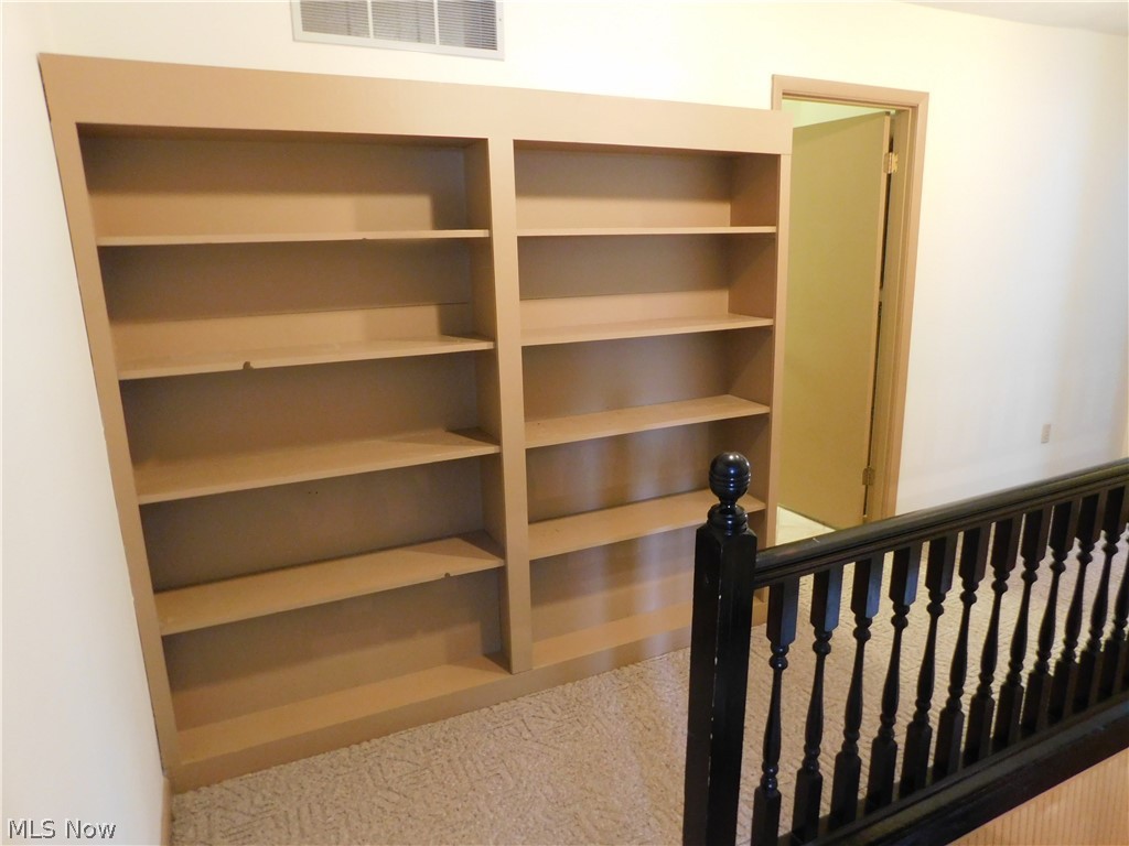 381 Lance Road Davisville, WV 26142 - Photo 24 of 34 More shelving in the hallway upstairs.