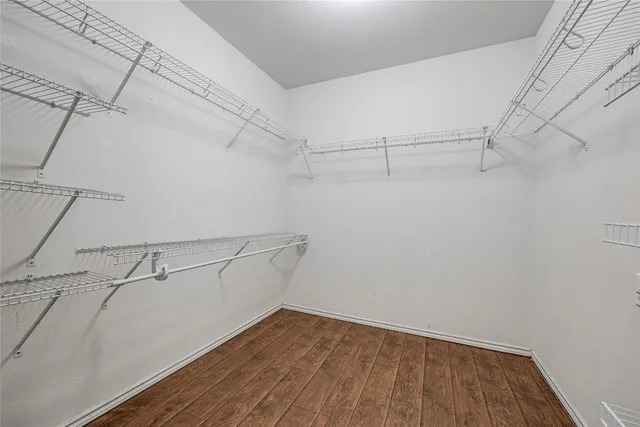 a view of a room with racks on the wall