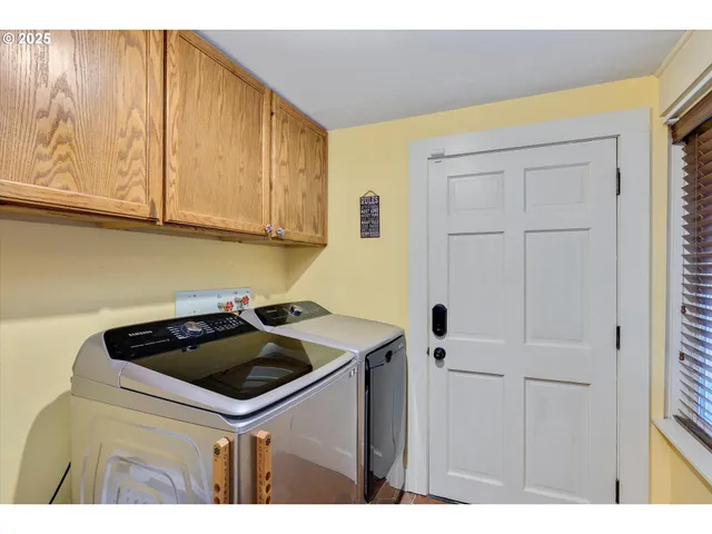 a kitchen that has a sink and cabinets
