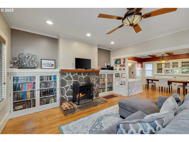 a living room with furniture and a fireplace