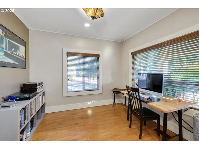 a view of a workspace with furniture