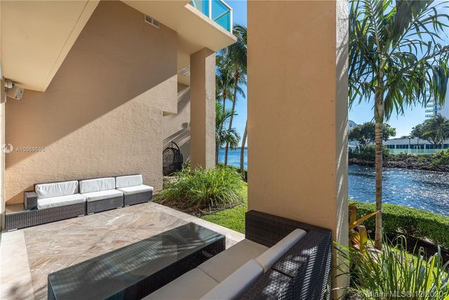 a potted plants sitting in front of a house