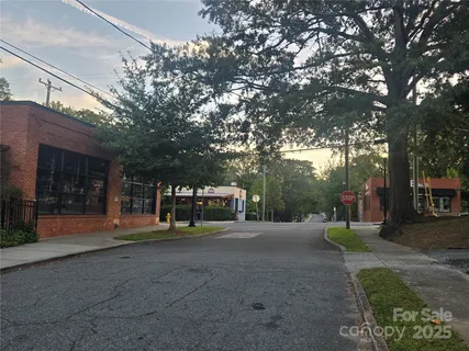 a view of a house with a outdoor space and sitting area