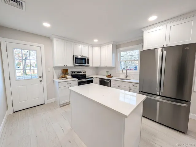 $499,999 | 15 Short Street, Flanders, NY 11901