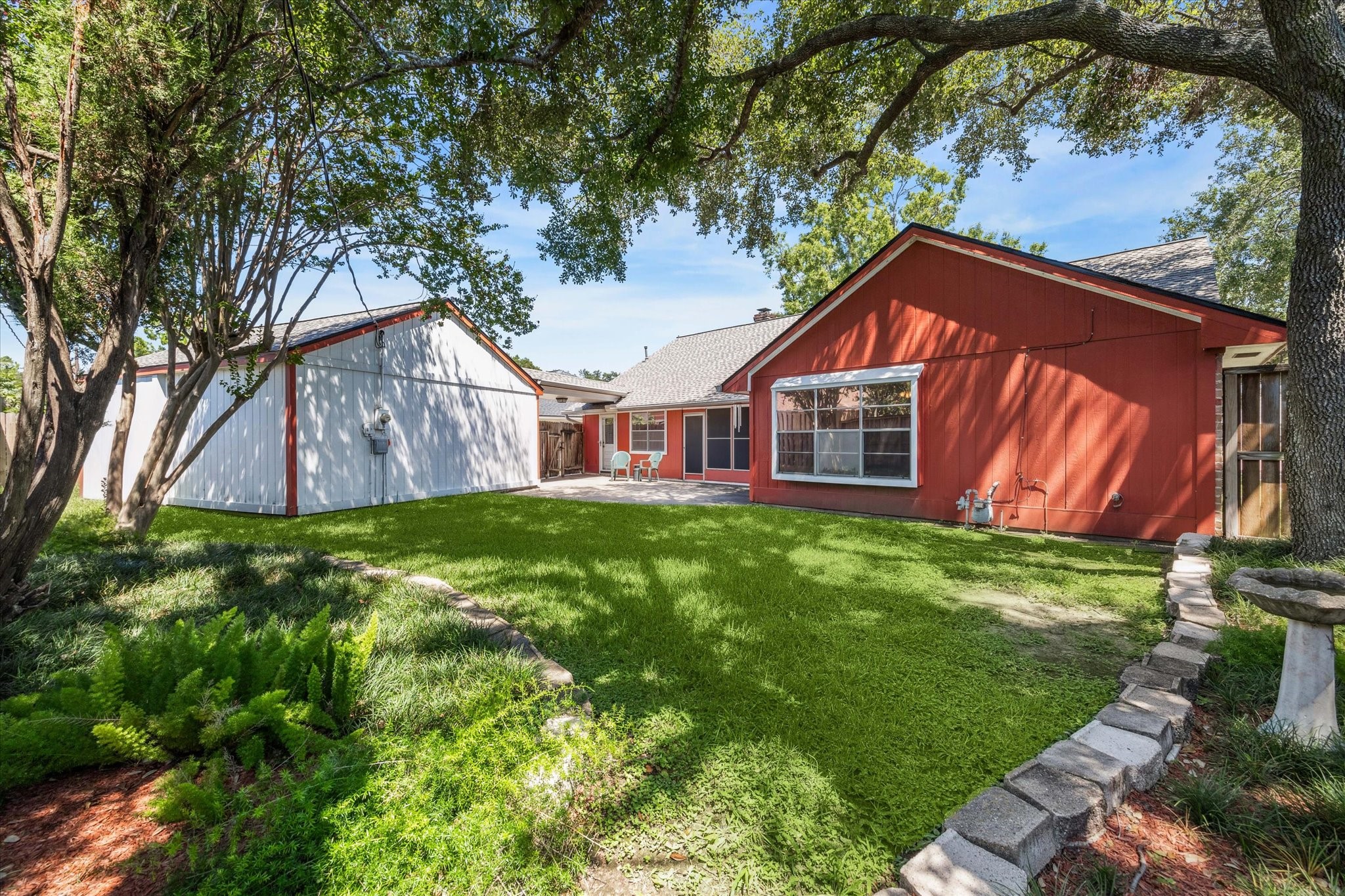 3019 Stetson Lane Houston, TX 77043 - Photo 27 of 28 Spacious backyard perfect for outdoor gatherings and relaxation.