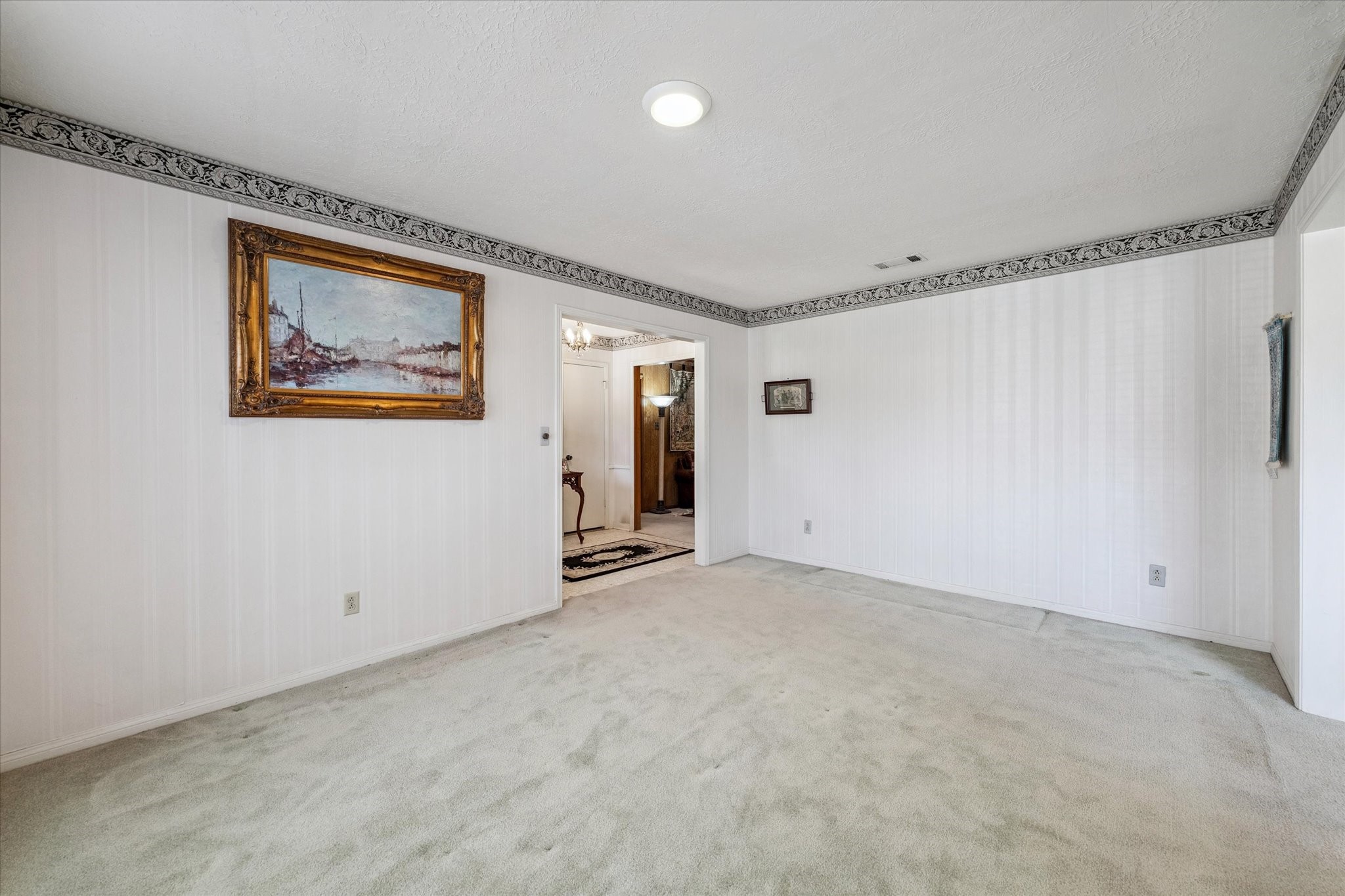 3019 Stetson Lane Houston, TX 77043 - Photo 7 of 28 Open and airy space with floor-to-ceiling windows and direct access to a formal dining room.