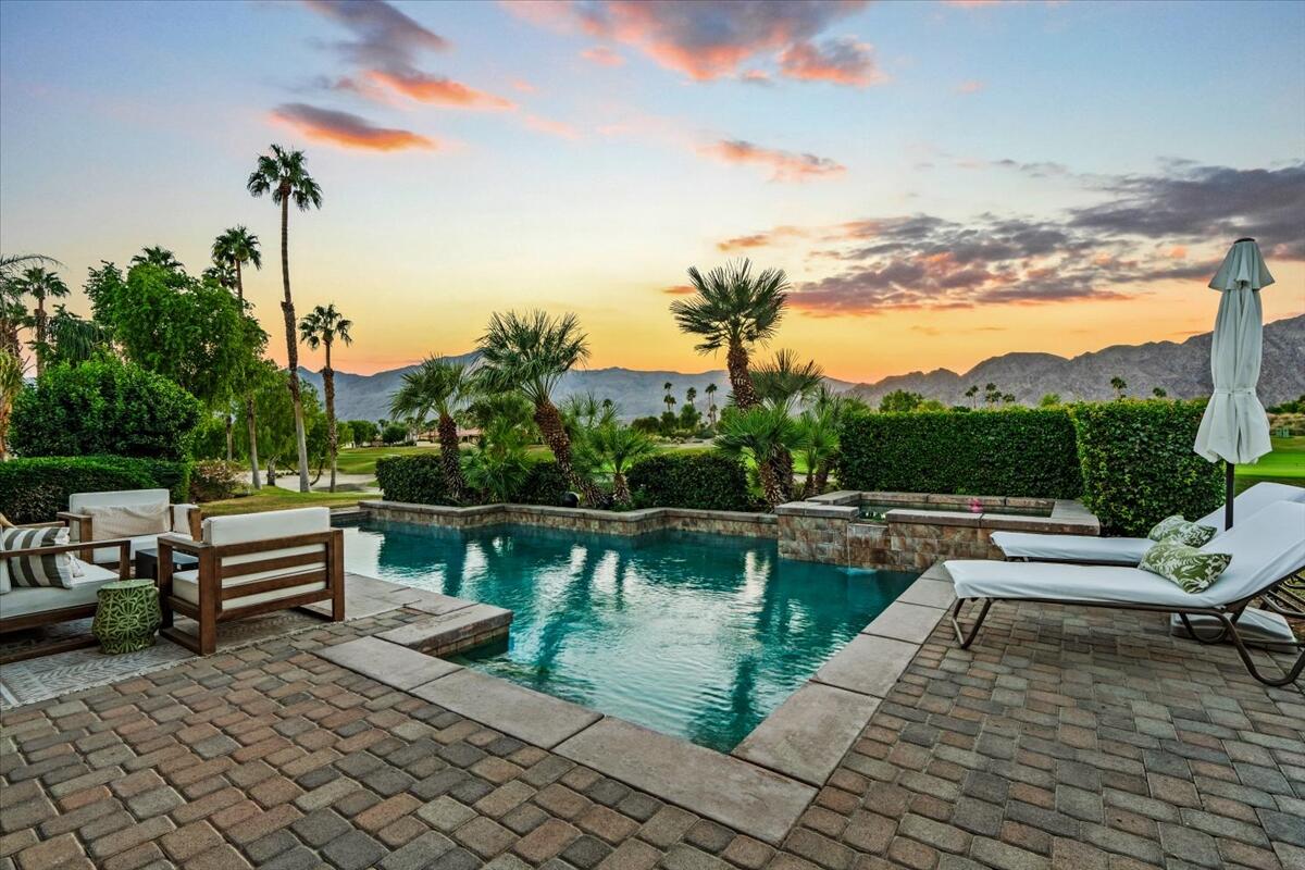 54695 Winged Foot La Quinta, CA 92253 - Photo 23 of 51 a view of a lake with tables and chairs