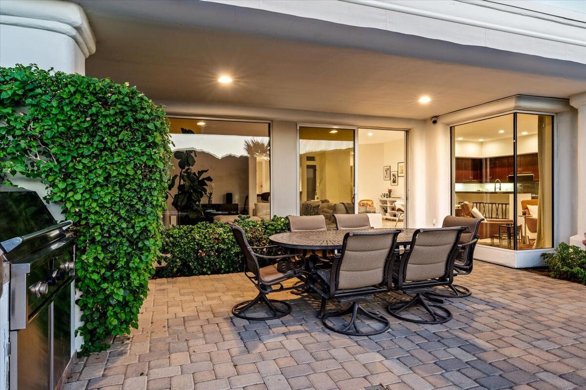 54695 Winged Foot La Quinta, CA 92253 - Photo 26 of 51 a view of a dining room with furniture and wooden floor