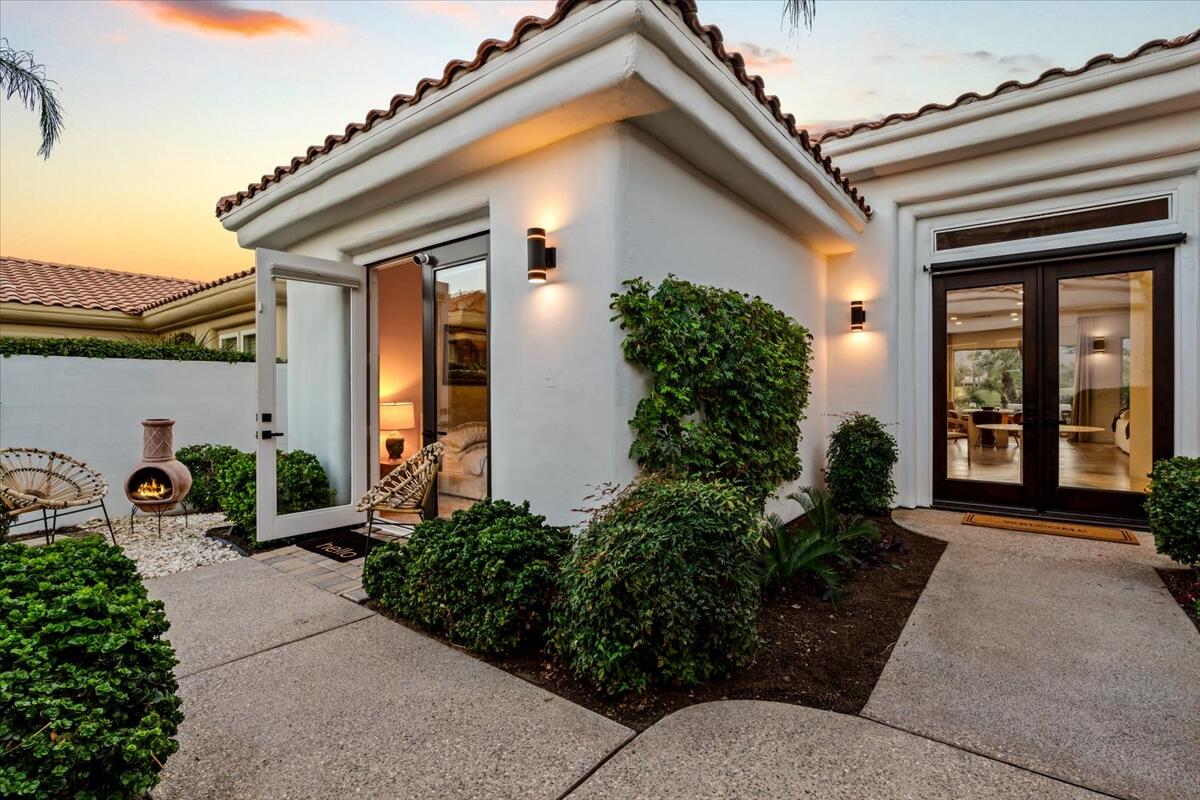 54695 Winged Foot La Quinta, CA 92253 - Photo 32 of 51 a front view of a house with garden