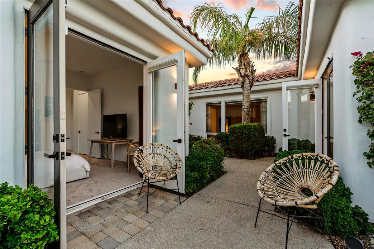 54695 Winged Foot La Quinta, CA 92253 - Photo 33 of 51 a view of patio with a table and chairs and potted plants