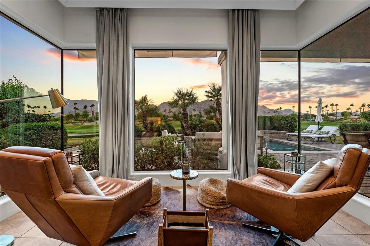54695 Winged Foot La Quinta, CA 92253 - Photo 4 of 51 a living room with furniture and a large window
