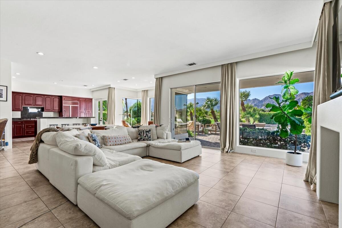 54695 Winged Foot La Quinta, CA 92253 - Photo 8 of 51 a living room with furniture and a potted plant