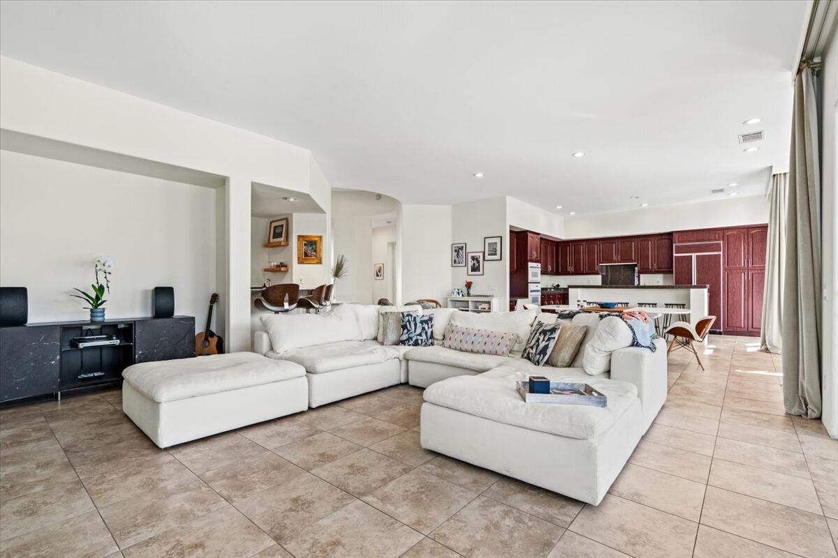 54695 Winged Foot La Quinta, CA 92253 - Photo 9 of 51 a living room with furniture and a couch