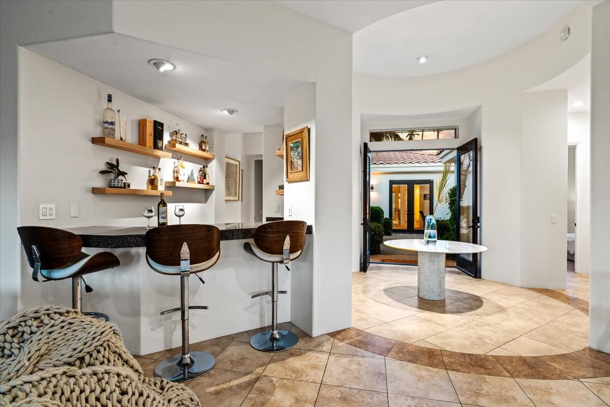 54695 Winged Foot La Quinta, CA 92253 - Photo 10 of 51 a view of a kitchen and dining room