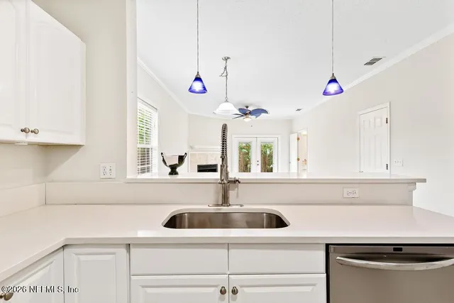 a view of kitchen with wooden floor