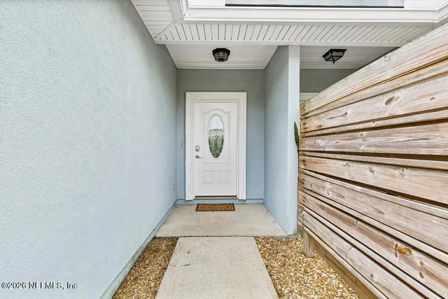 a kitchen with a sink and a window