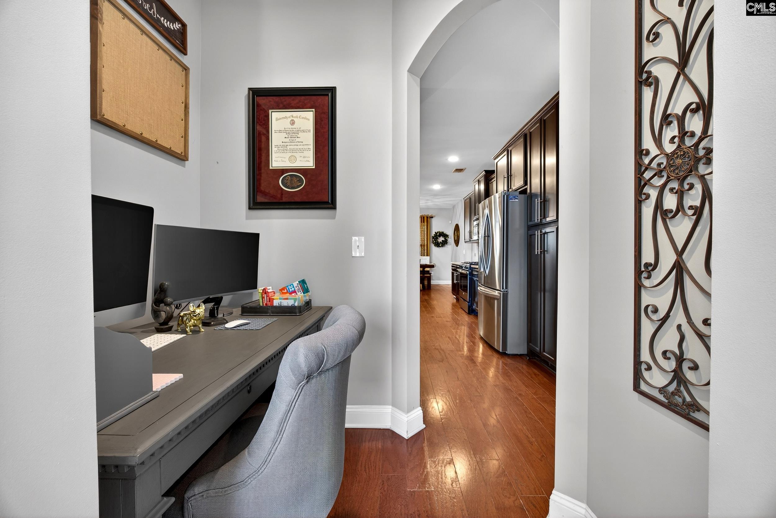 116 Renard Way Gilbert, SC 29054 - Photo 31 of 74 a view of a workspace with furniture and wooden floor