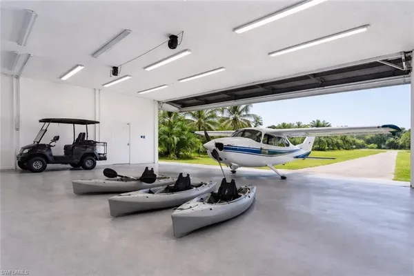 a room with gym equipment and a large window