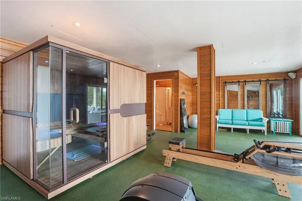 a view of a balcony with two chairs