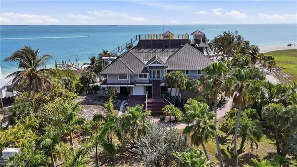 an aerial view of a house with a garden