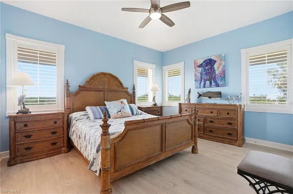 a bed room with a bed and a window