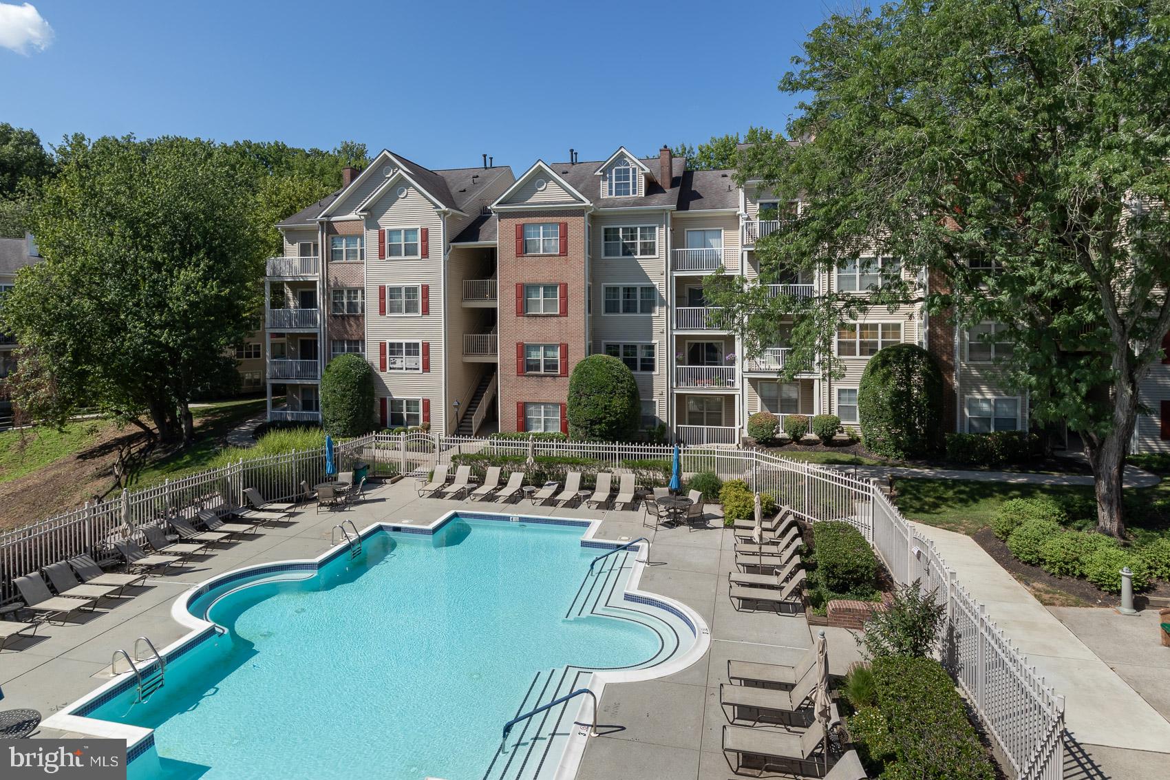 6832 I Hayley Ridge Way, Unit I Baltimore, MD 21209 - Photo 27 of 31 Serene poolside retreat awaits you.