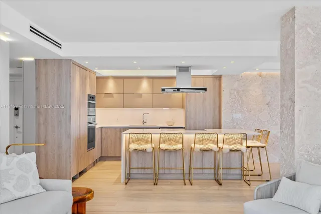 a view of a livingroom with furniture and wooden floor
