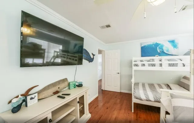 a room with furniture and wooden floor