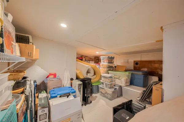 a view of a workspace with furniture