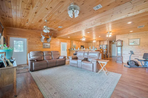 a living room with furniture and a table