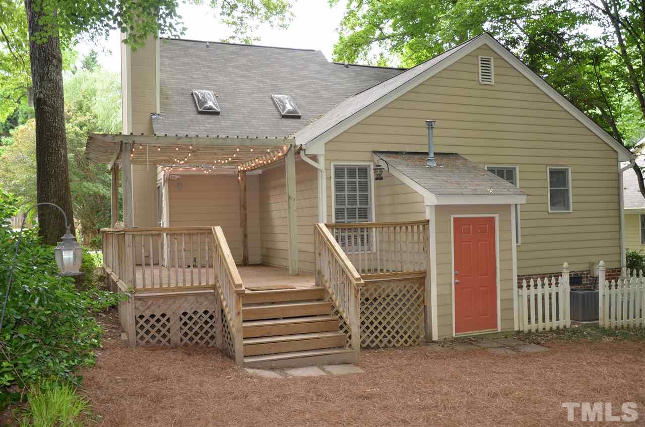 8816 Life Lane Raleigh, NC 27615 - Photo 2 of 25 a view of a house with a fence