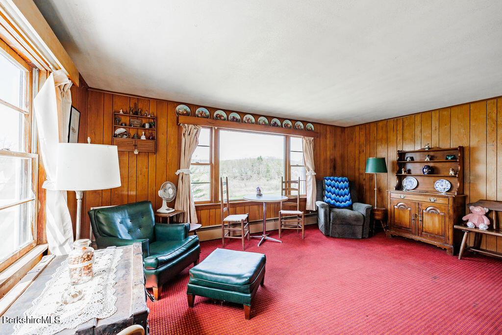 45 Swamp Road West Stockbridge, MA 01266 - Photo 14 of 56 a living room with furniture and a flat screen tv