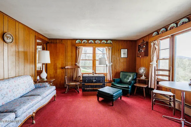 a room with furniture and window