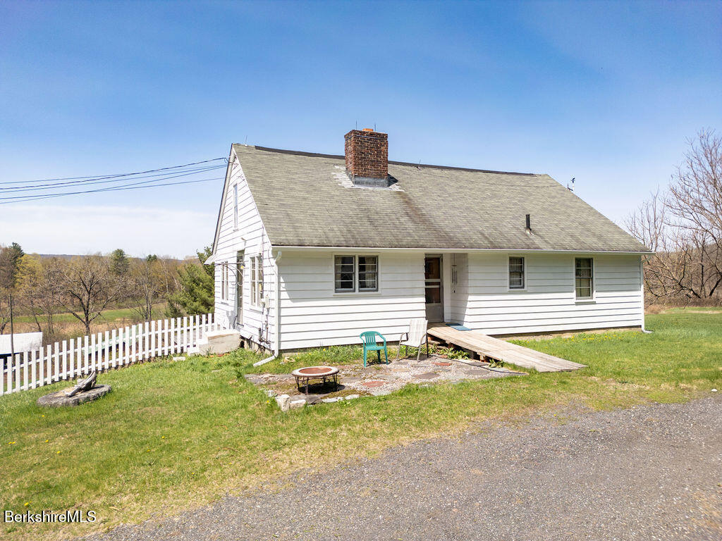 45 Swamp Road West Stockbridge, MA 01266 - Photo 2 of 56 a front view of a house with a yard