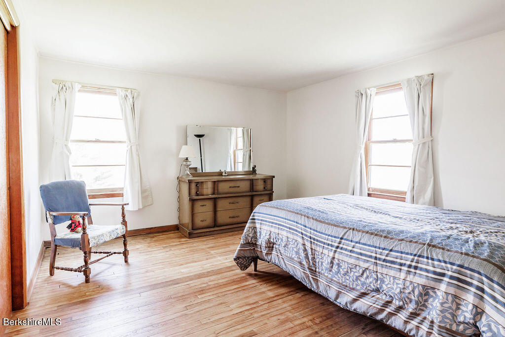 45 Swamp Road West Stockbridge, MA 01266 - Photo 23 of 56 a bedroom with a bed and a window