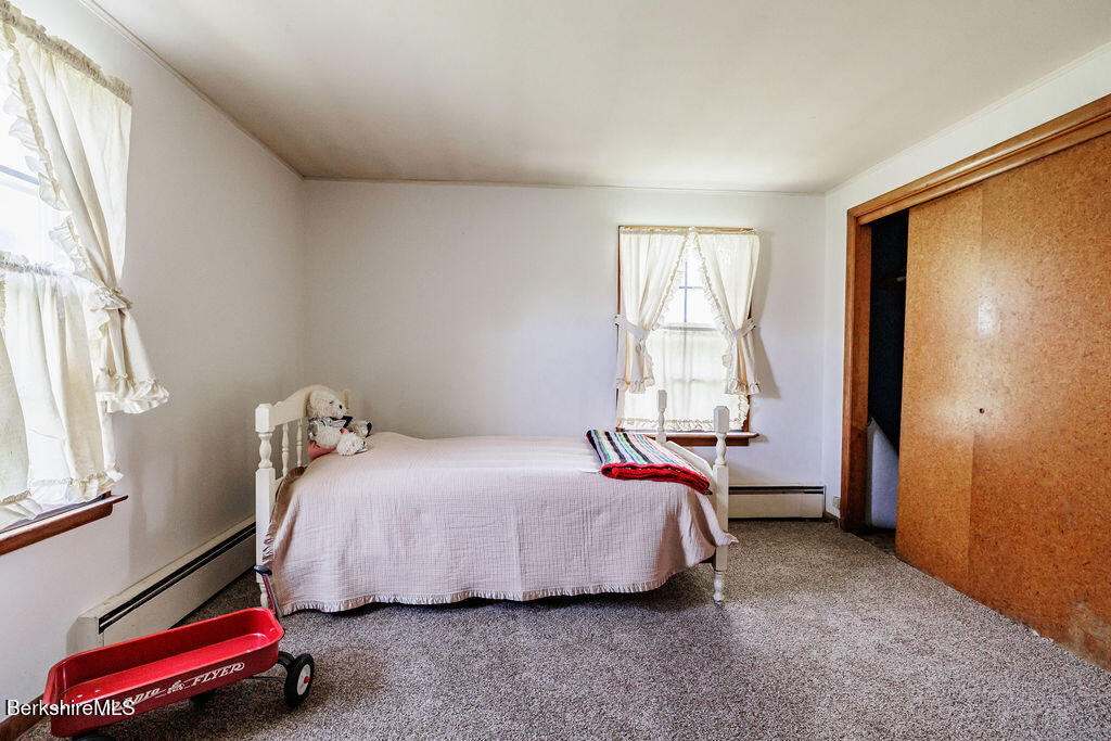 45 Swamp Road West Stockbridge, MA 01266 - Photo 24 of 56 a bedroom with a bed and a window