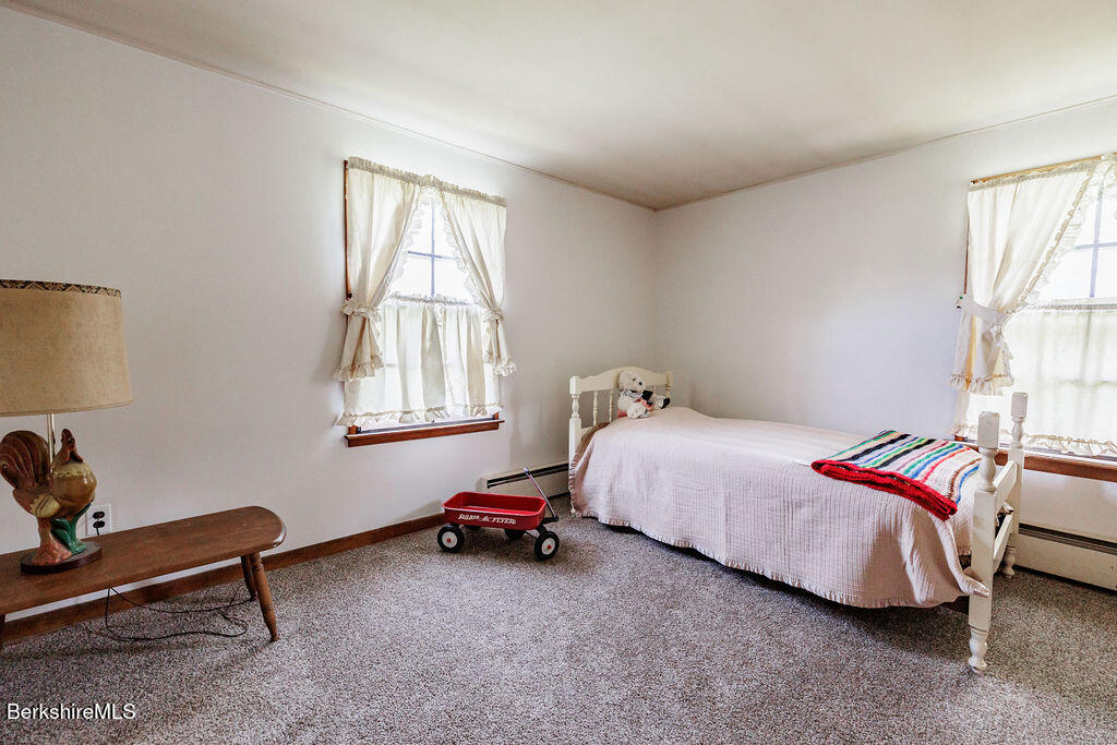 45 Swamp Road West Stockbridge, MA 01266 - Photo 25 of 56 a bed room with a bed chair and a window
