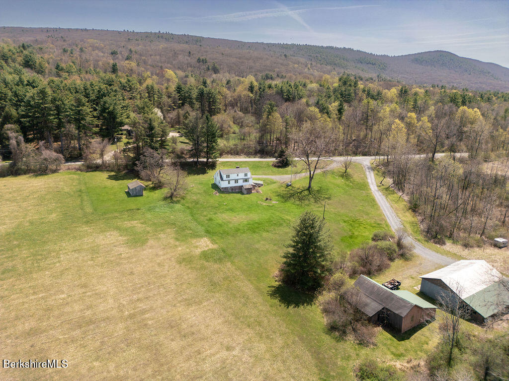 45 Swamp Road West Stockbridge, MA 01266 - Photo 39 of 56 a view of a lush green hillside and houses