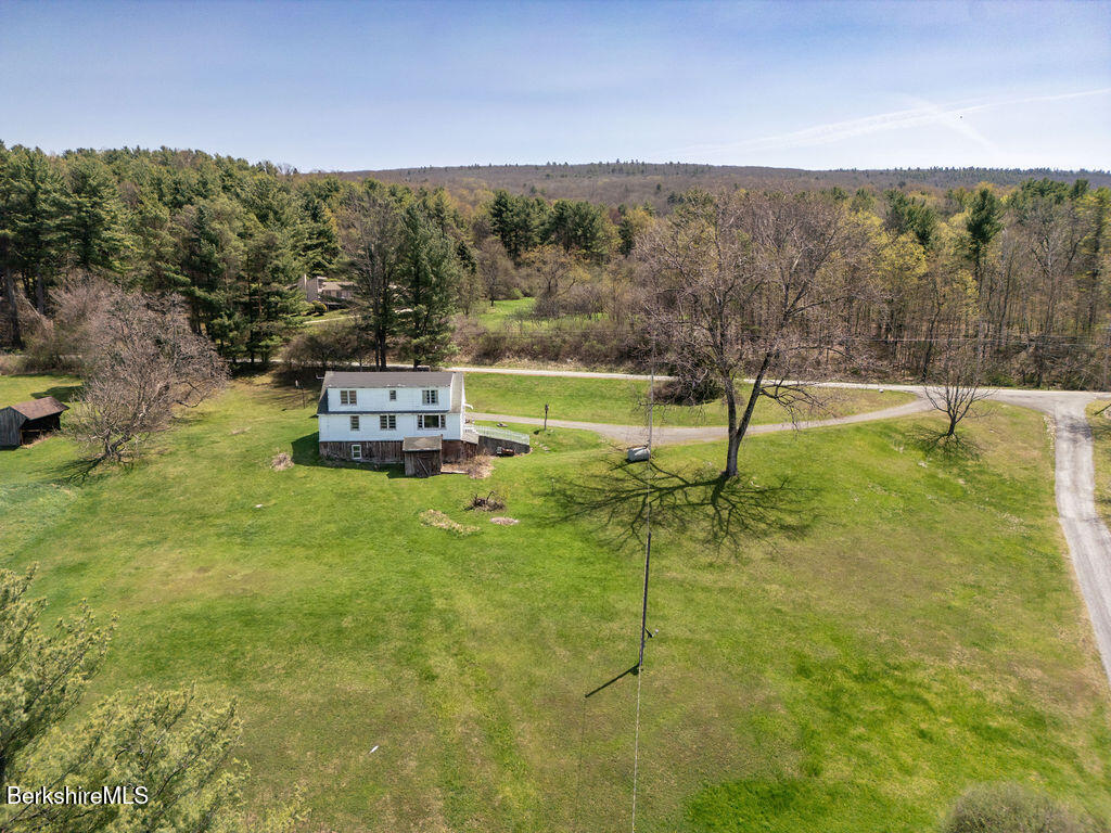 45 Swamp Road West Stockbridge, MA 01266 - Photo 40 of 56 a view of a lake with a mountain