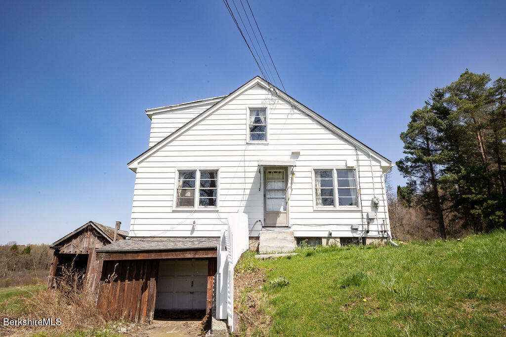 45 Swamp Road West Stockbridge, MA 01266 - Photo 43 of 56 a front view of a house with a garden
