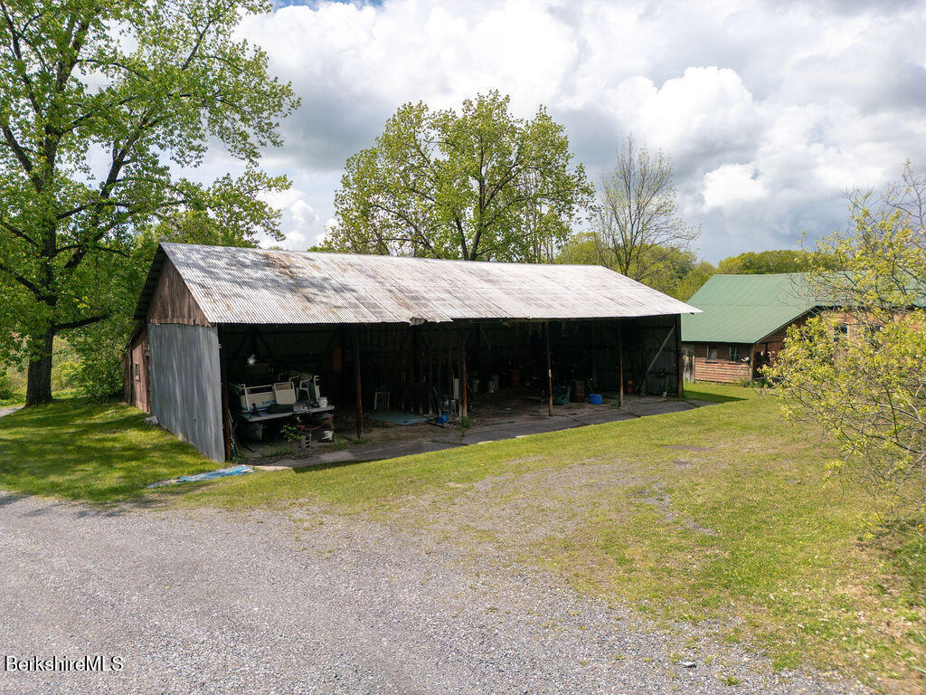 45 Swamp Road West Stockbridge, MA 01266 - Photo 47 of 56 a view of a house with swimming pool and sitting area