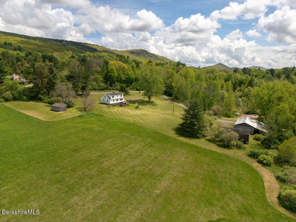 45 Swamp Road West Stockbridge, MA 01266 - Photo 6 of 56 a view of a lake with houses