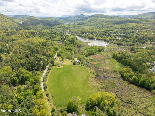a kitchen that has a sink and a stove