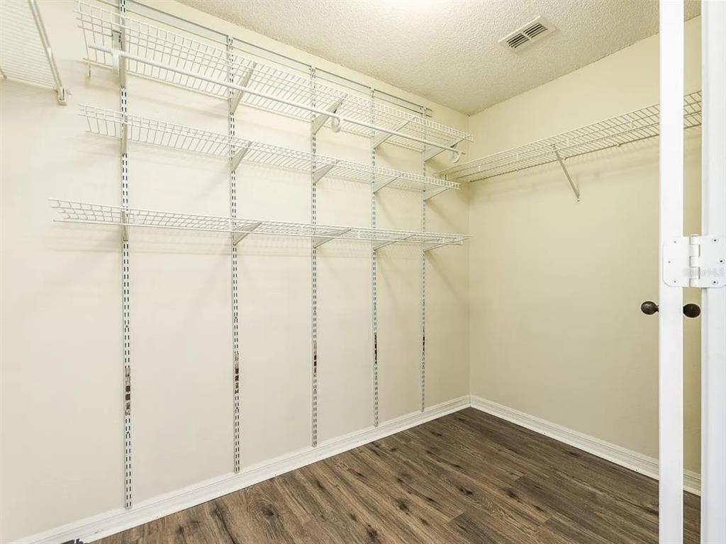 10000 Southwest 52nd Avenue, Unit 99 Gainesville, FL 32608 - Photo 11 of 19 a view of a room with wooden floor